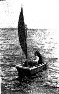 Лодка на ходу под парусом