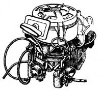 Двигатель с установленными на нем двумя карбюраторами