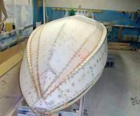 Монтаж наружной обшивки закончен. Заделываются головки шурупов